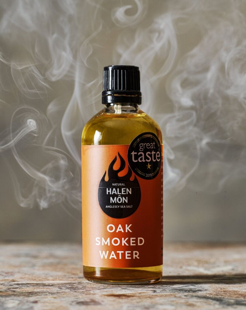 Oak_Smoked_Water_100ml_Glass_Lifestyle_with_smoke_3